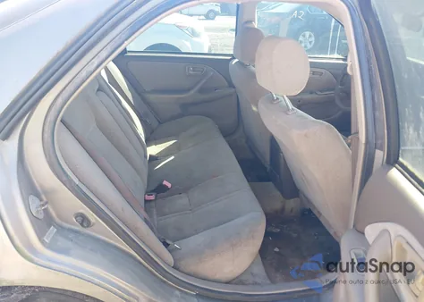 2001 Toyota Camry Le z USA, uszkodzony, nr VIN 4T1BG22KX1U024018